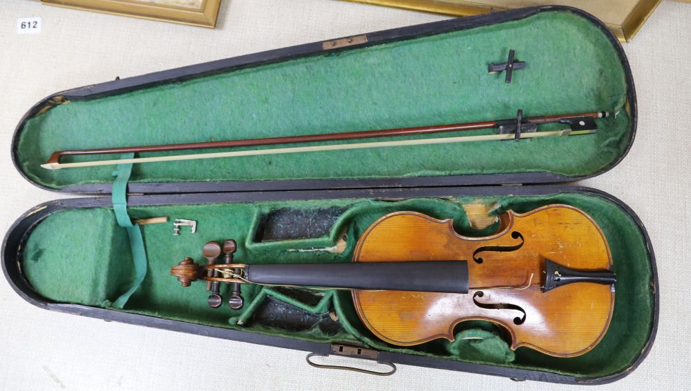 A late 19th century French 1/4 size violin, unlabelled, cased with a bow